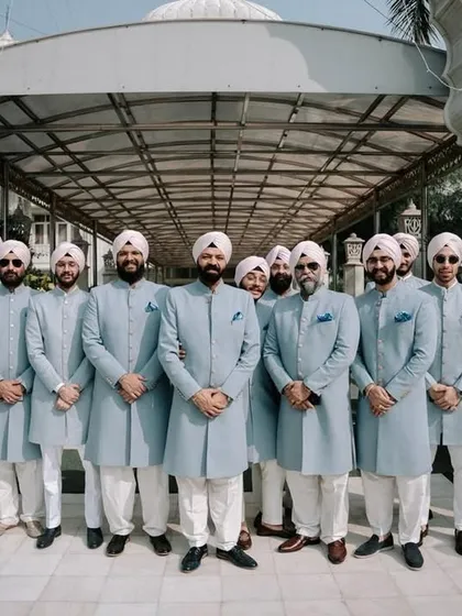 A moment of unity and style for the groom and his crew. We specialize in creating coordinated, bespoke outfits that make your entire wedding party look and feel their best, ensuring a timeless and elegant statement.