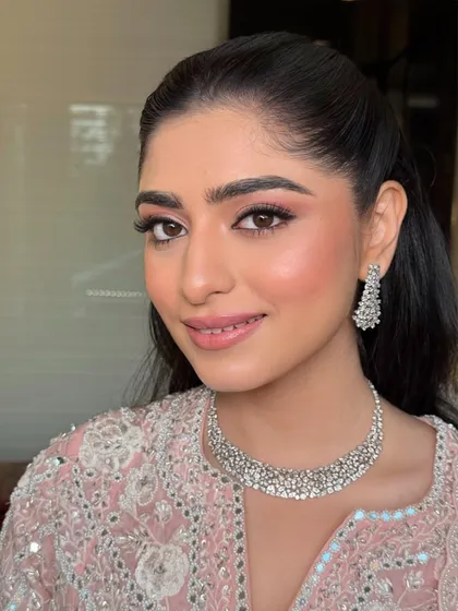 A close-up of Shubhangi's Roka makeup. The soft pink tones on her eyes and cheeks create a fresh and youthful glow.