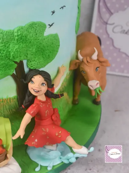 This joyful child jumping in a puddle symbolizes abundance and prosperity on the 'Dharma' side of the cake. Every figurine, no matter how small, plays a part in telling the larger story.