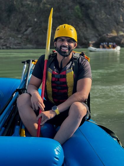 Enjoying a moment of adventure with some river rafting in Rishikesh.