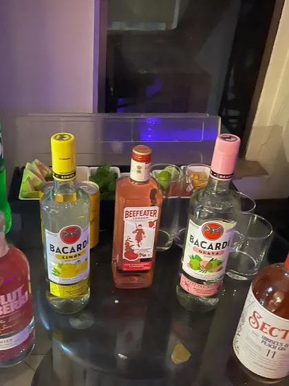 A selection of flavored Bacardi and Beefeater gins for a pink-themed birthday party. We can create a drink menu based on your favorite flavors or colors.