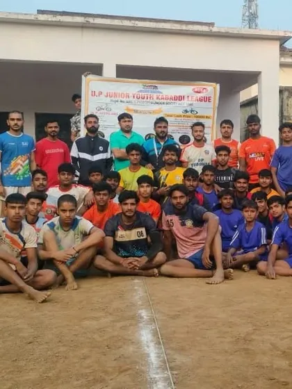 A group photo with the banner of the DP Junior Youth Kabaddi League after a successful trial event. We actively participate in leagues that promote young talent.
