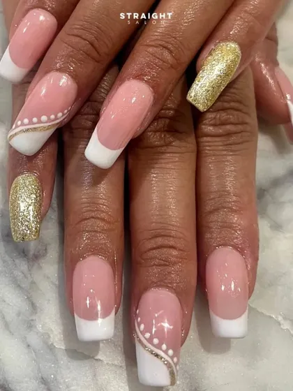 A close-up on the details of this French set, showing the clean smile lines and the beautiful gold glitter accent nail.