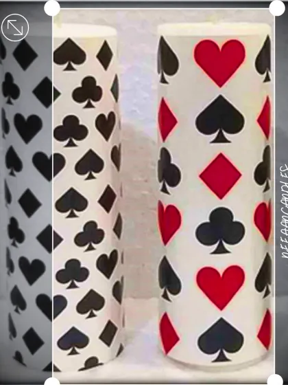 For the poker nights and card parties. These pillar candles are decorated with the four card suits, making every flame a wild card.