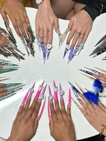 This is what our community of artists creates. This image shows a variety of advanced nail extension styles made by my talented students, showcasing everything from intricate patterns to bold 3D designs. You will learn how to create stunning, portfolio-worthy nail art just like this.