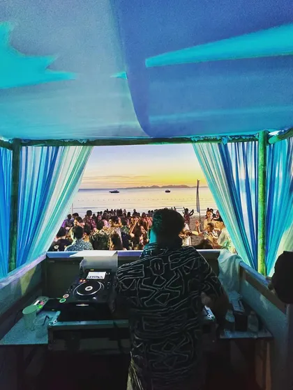 The view from my DJ booth as the sun sets over a beach party in Bali. Creating the perfect sunset soundtrack is one of my favorite things to do.