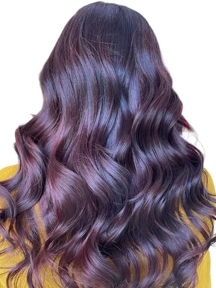 A global hair color transformation resulting in this deep, vibrant, and uniform shade.