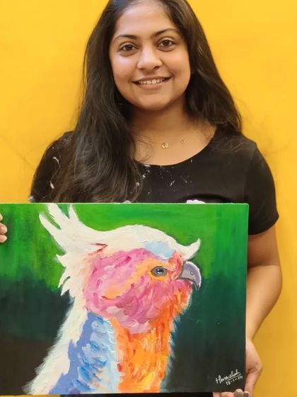 A colorful parrot painted with a palette knife. This student embraced a vibrant palette, using the knife to create a playful, energetic texture that brings the bird to life.
