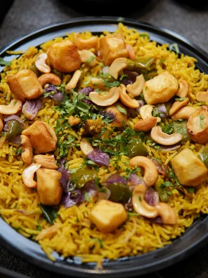 A close-up of the Amroha Pulao from our Iftaar Box, a flavorful rice dish with paneer and cashews.