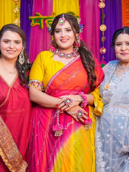 A beautiful family portrait from the Mehendi, with all the ladies looking their best.