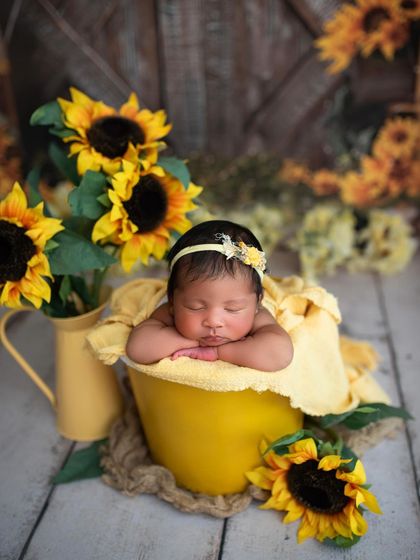 A bucket of sunshine! This sunflower-themed setup is so bright and cheerful, perfect for a happy little baby.