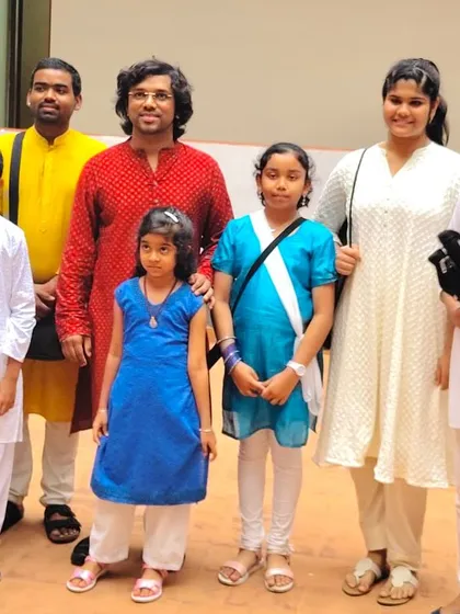 Our flute guru and his students pose for a group photo, celebrating their successful Jugalbandi performance.