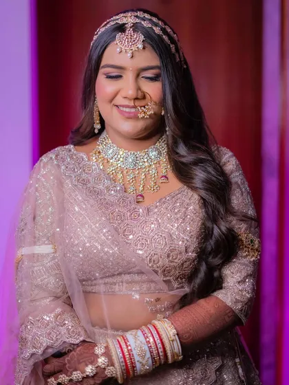 Palak's eyes are softly defined to make them pop, while her skin looks absolutely flawless and dewy. A perfect example of my 'glass-skin' specialty.