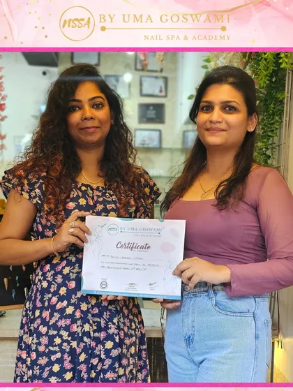 Pallavi with her well-deserved certificate. She completed two courses with us and is now ready for professional work.