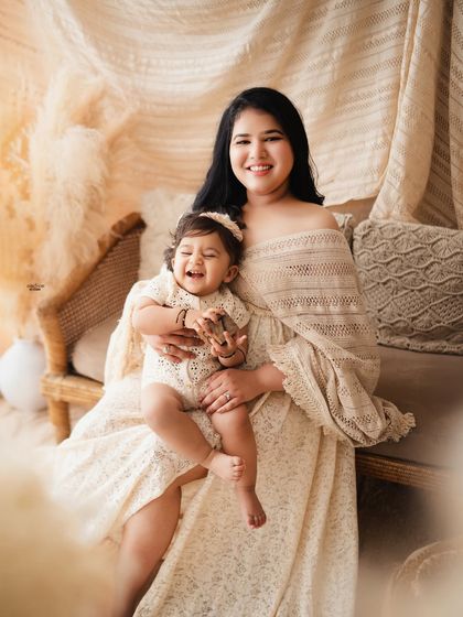 Laughter and love. This candid shot of a mother and her baby girl sharing a happy moment is just priceless.