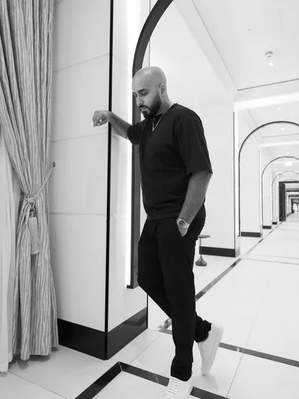 A moody black and white shot in a hotel corridor. The life of a traveling DJ is full of these in-between moments.