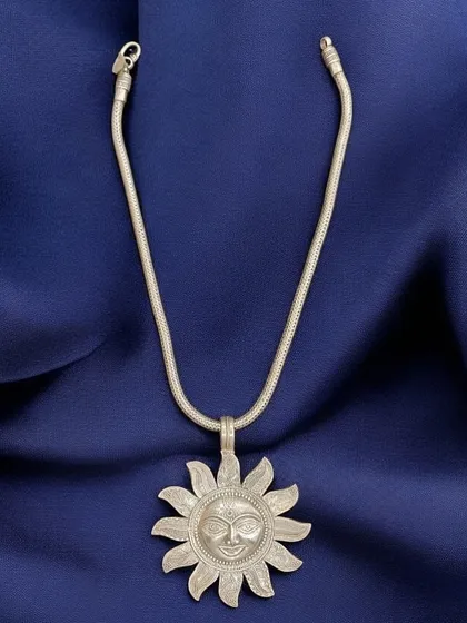 A premium pure silver necklace featuring a large, smiling sun pendant. This piece is hung on a thick, snake-like silver chain and has a wonderfully cheerful and bold presence.