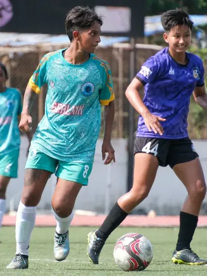 Two players challenging for the ball, a display of the competitive spirit in the league.
