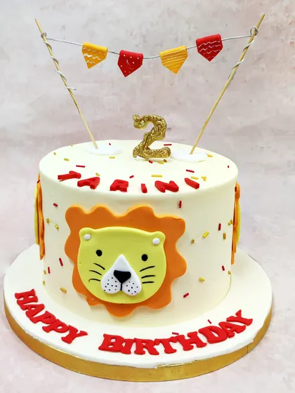 A centered shot of the cartoon lion cake, showing its simple yet adorable design that's sure to make any child smile.