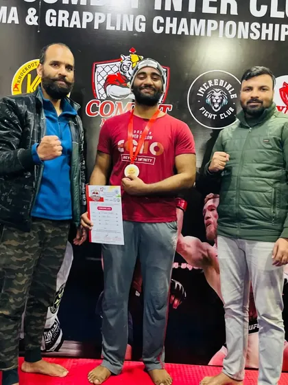 Posing with one of our gold medal winners at the 12th Inter-Club Championship. Seeing our students succeed is the greatest reward.