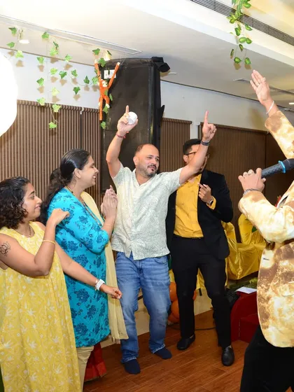 More fun and games at a family event. I use simple props and a lot of energy to make sure my icebreakers are a hit with guests of all ages.