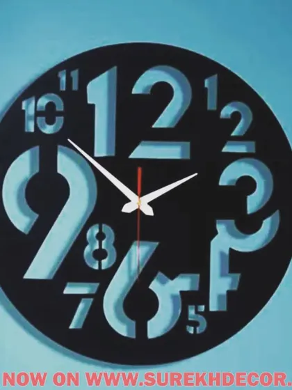 A playful and modern design, this 3D digit wall clock uses negative space to create its numbers. The effect is visually interesting and unique, offering a fun twist on a traditional clock face.