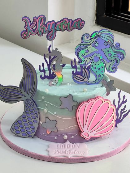 Dive into a magical underwater world with this mermaid-themed cake. The process video shows how I bring the ocean to life with pastel colors, fondant details, and whimsical sea creatures.