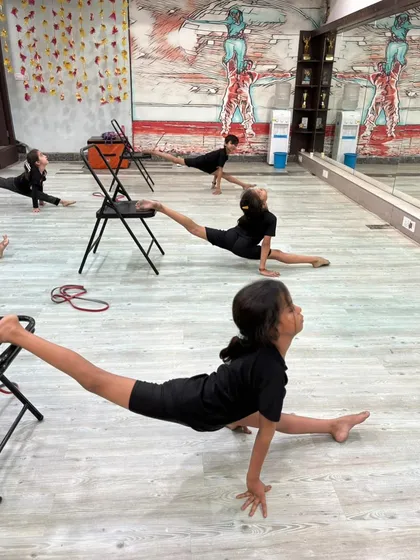 The dedication is clear as our students push their limits in this flexibility training session.