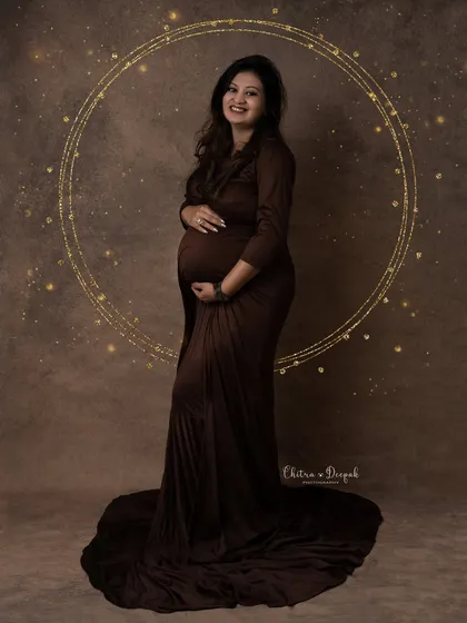 A beautiful portrait in a simple brown gown, enhanced with a sparkling digital backdrop. This shows how we can add a touch of magic to any shot.