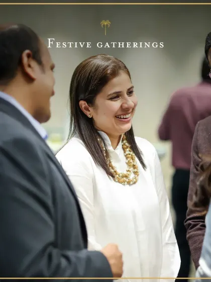 A guest enjoying a moment at a festive gathering. The smiles on your guests' faces are the true measure of our success.