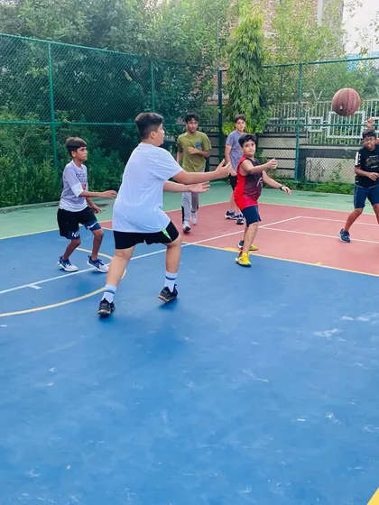 A player passes the ball to a teammate.