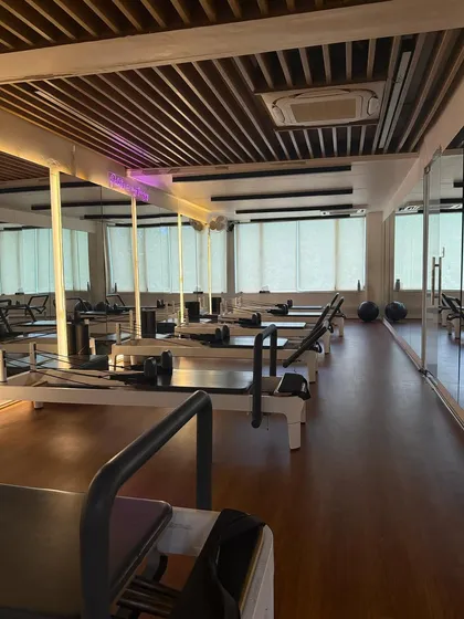 An empty studio full of potential. This is where transformations happen, one reformer class at a time.