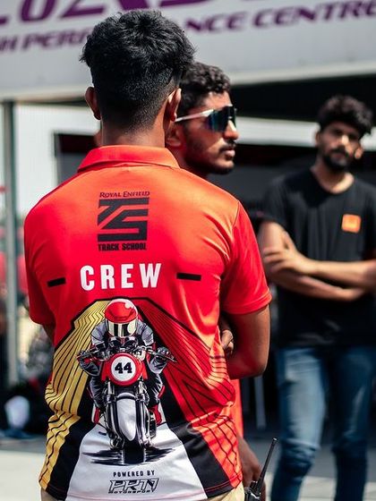 The back of our team's "CREW" t-shirts.