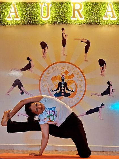 Demonstrating a variation of Visvamitrasana. I am constantly exploring my own practice to better guide my students.