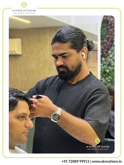 Our Creative Art Director Ram Gore demonstrating his craft, focusing on the fine details that elevate a simple haircut into a personalized style statement.