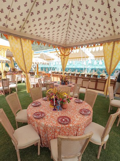 A beautiful tablescape from the Rajasthani Haldi, featuring the custom hand-painted terracotta charger plates. This was a wonderful collaboration with local artisans.