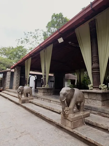The entrance to the main pavilion, decorated with simple drapes and our stone elephant statues, ready to welcome guests.