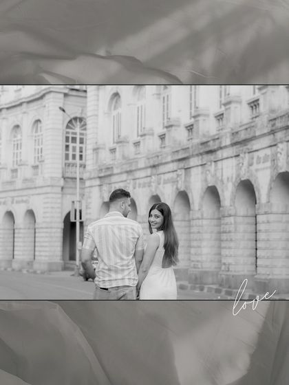 A classic black and white shot of the couple walking through the historic colonnades of South Mumbai. The monochrome edit adds a timeless, elegant feel to their urban love story.