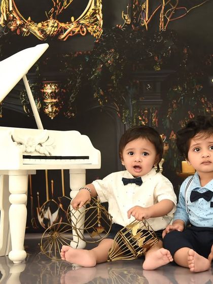A special session for twin boys. The classic piano setup provides a wonderful opportunity for them to interact and for me to capture their unique bond.