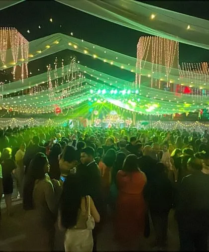 The view from our stage is often a sea of happy faces. This shot from a huge festive event captures the scale of the parties we play and the electric atmosphere we create.