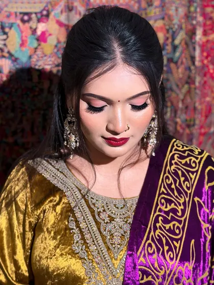 A serene portrait with eyes closed, highlighting the beautiful blending of the eyeshadow and the flawless skin.