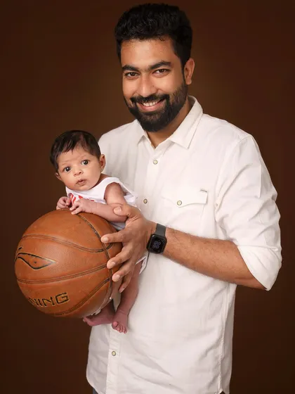 A father’s dream realized. He wanted to include his love for basketball in his son's first photoshoot, and we created this powerful legacy portrait. It’s more than a photo; it’s the beginning of a story, capturing a father's love and the future he imagines for his child.