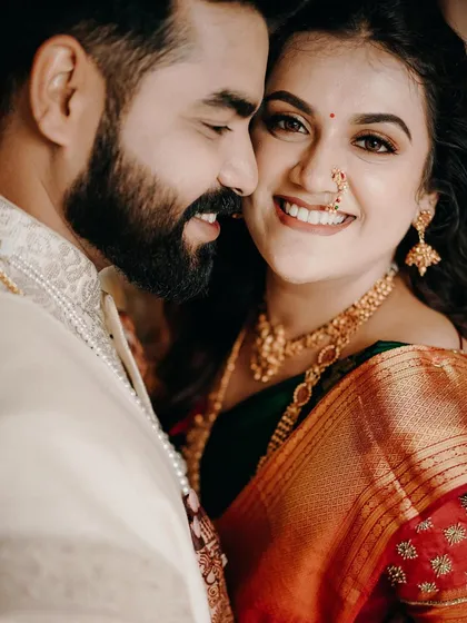 A close-up portrait that shows the warmth and happiness of an engagement shoot. Her beautiful smile and the genuine affection in his eyes say everything.