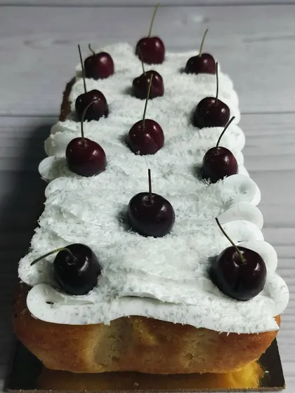 For a taste of the tropics, I offer this Pina Colada Tea Cake. It’s infused with fresh pineapple and coconut, and topped with a pineapple whipped cream and fresh cherries.