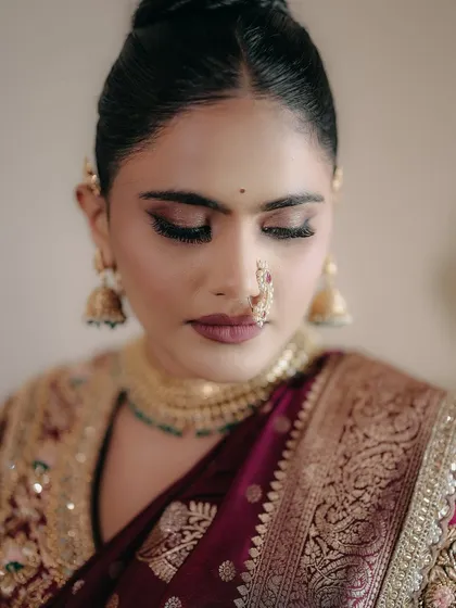 The eye makeup in detail. We created a soft cut-crease with a sharp liner to give the eyes a defined and elongated look, perfect for a bold bridal statement.