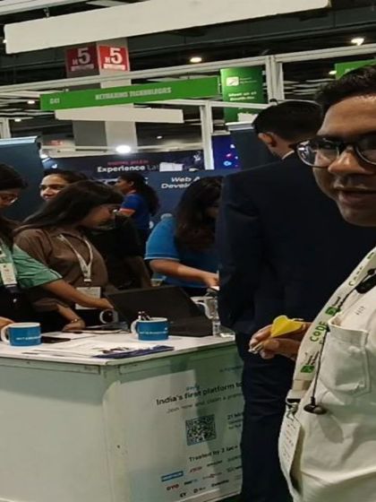 A candid shot from the convention floor, where my team and I were exploring different booths. It's a great environment for learning about new web development frameworks and SEO techniques.