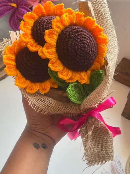 This custom order of three bright sunflowers is ready to go. I love how the simple, rustic burlap wrap makes the vibrant yellow of the crochet petals pop. A perfect handmade gift.
