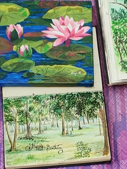 A couple of my small paintings, a lotus pond and a park scene, side-by-side. These smaller pieces are great for collecting and creating your own gallery wall.