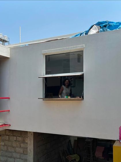 An artist's studio should have a connection to the world outside. This simple, wide-opening window allows the artist to look out over the landscape, serving as a source of both light and inspiration.