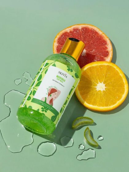 A juicy and refreshing shot. We placed this moringa body wash in a pool of water with slices of grapefruit and orange, creating a vibrant, high-energy image that highlights its citrus notes.